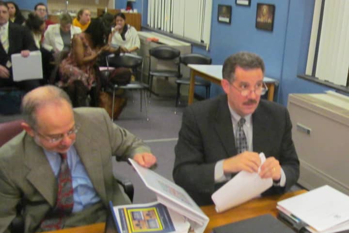New Rochelle City Manager Charles Strome, right, and Finance Commissioner Howard Rattner present the city&#x27;s proposed 2013 budget to City Council members Tuesday.