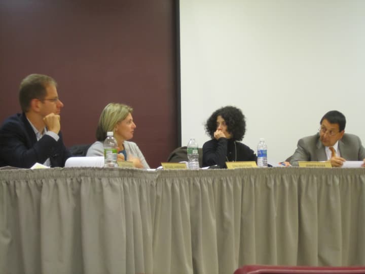 Members of the Briarcliff Board of Education talk about revising the district&#x27;s head lice policy Tuesday evening. 