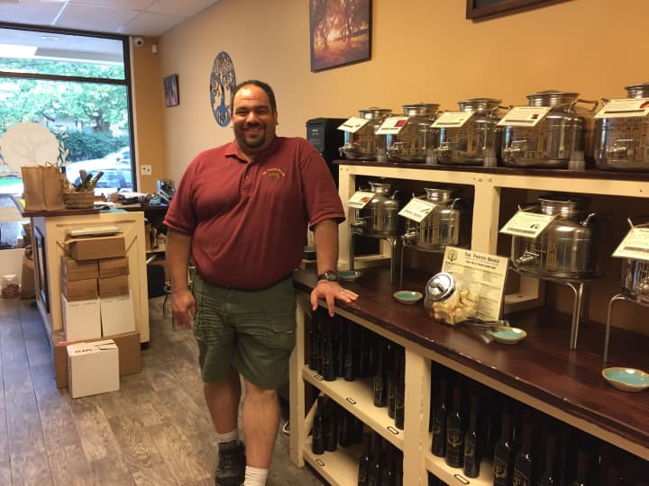 White Plains resident Richard Cozza in his new store, The Twisted Branch.