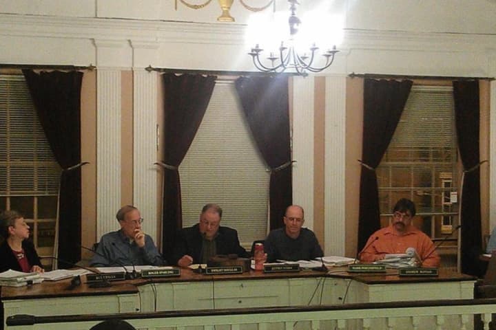 Dwight Douglas, center, presided over his final meeting at Peekskill Planning Commission Chair Wednesday night.