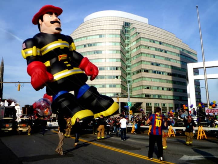 The Stamford Volunteer Fire Department carries Billy Blazes across the finish line at last year&#x27;s Balloon Spectacular. 