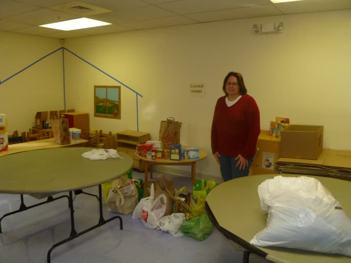 Gail Lent from the Covenant Church of Easton in room used to store donated items for hurricane relief.