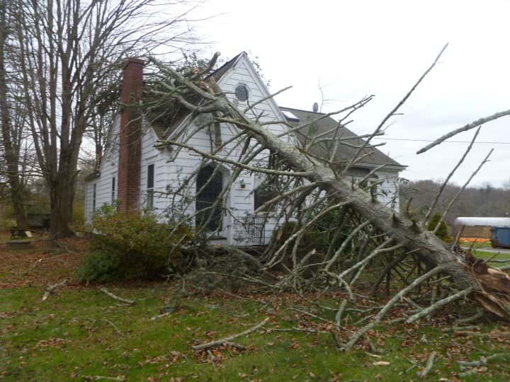 Weston area homes are hit with tree damage during Hurricane Sandy.