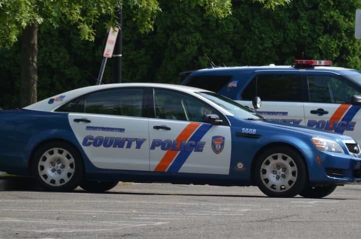 Westchester County police cars patrol Mount Kisco.