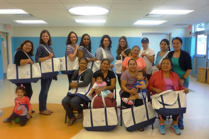 Some of the &quot;community messengers&quot; trained by Promise for Children Partnership are shown recently at the Head Start Building in Danbury.