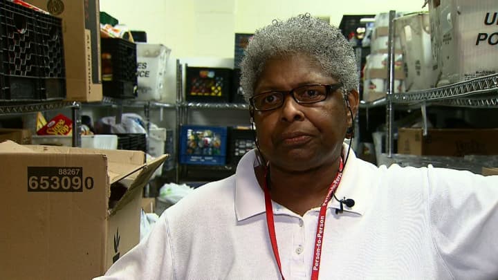 Anita Osborne, a Person-to-Person food pantry volunteer for 11 years, was named a &quot;Hometown Hero&quot; by News 12 Connecticut.