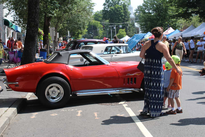 A Corvette Stingray is admired during last Saturday&#x27;s Ridgefield Summerfest.