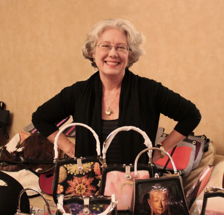 Art Bags founder Debora Crichton displays some of her artisan handbags for Wine, Cheese and Accessories, a Ladies Night Out at 6 p.m. on Oct. 7 at Founders Hall in Ridgefield.