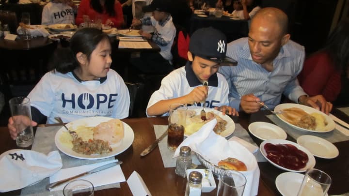 New York Yankees legendary pitcher Mariano Rivera will host a thanksgiving dinner for about 120 parents and children Tuesday at AJ&#x27;s Burgers in New Rochelle.