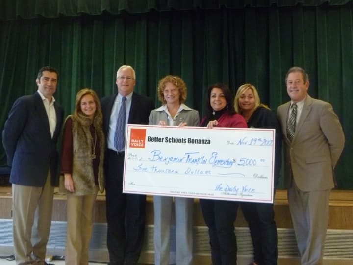 From left: Daily Voice President John Falcone, Daily Voice sales rep Donna Herman, Entergy&#x27;s Jim Steets, Principal Patricia McIlvenny-Moore, parent Marlene Maccarrone, PTA President Diane Kness and Lakeland Superintendent George Stone.