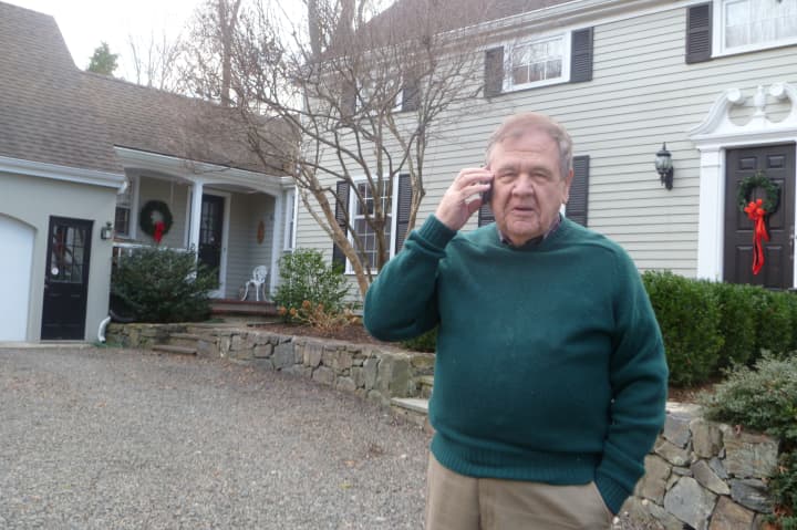 Geoffrey Pickard, a member of the New Canaan Utilities Commission, wants more people to fill out a town survey on cell phone coverage. He also wants coverage to be improved. 