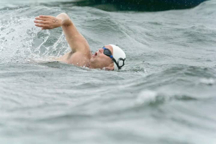 A swimmer powers through the water at last year&#x27;s Swim Across The Sound event in Long Island Sound, which benefits St. Anthony Medical Center in Bridgeport.