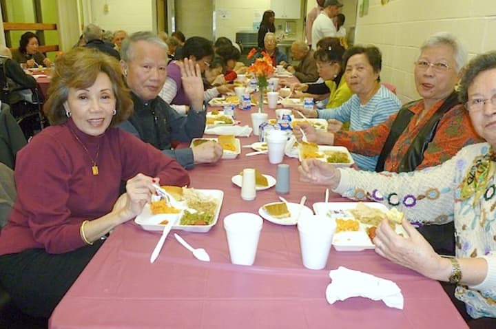 Attendees enjoy their lunch at the Thanksgiving event held at the Theodore D. Young Community Center in Greenburgh on Tuesday afternoon.
