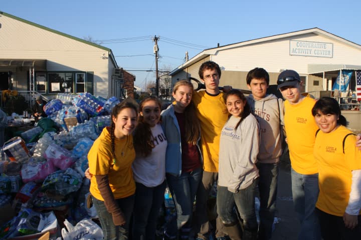Eight Yonkers students were part of a group from the Loyola School in Manhattan who recently traveled to Queens to hep with Hurricane Sandy cleanup.