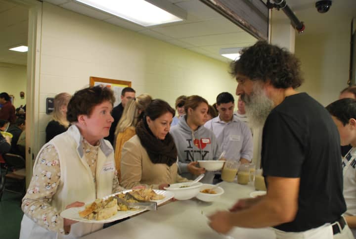 Volunteers lined up to serve food to guests at Thursday&#x27;s Thankksgiving meal at Peekskill&#x27;s United Methodist Church.