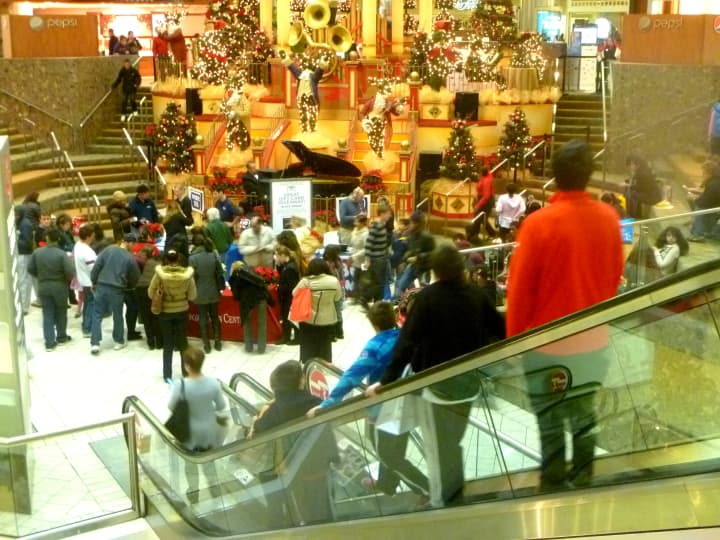 Shoppers looking for holiday gifts fill the Stamford Town Center on Black Friday a few years ago.