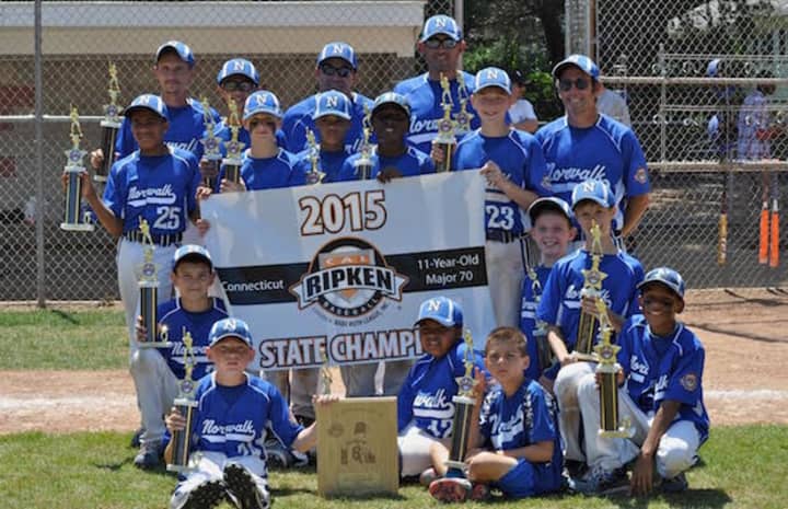 The Norwalk 11-year-old All-Stars celebrate after winning the state championship.