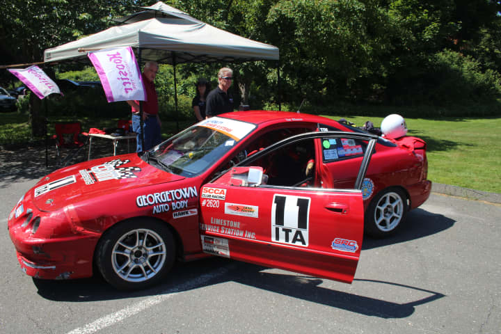 A race car takes center stage during Ridgefield&#x27;s Nutmeg Festival on Saturday.
