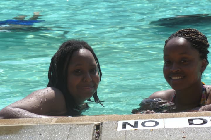 Alexis Frank, left, and Andee Pace swim at Kittrell Pool prior to the recent renovation. 