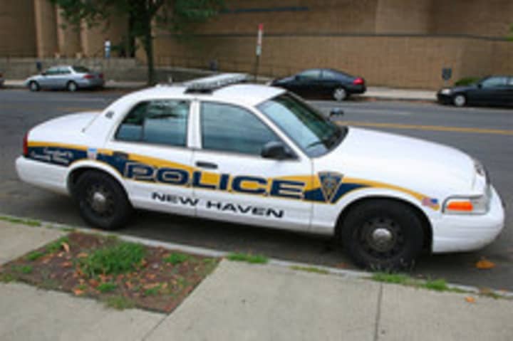 A Stamford man was grazed with a bullet while sitting in his car near a basketball court in New Haven on Sunday night.