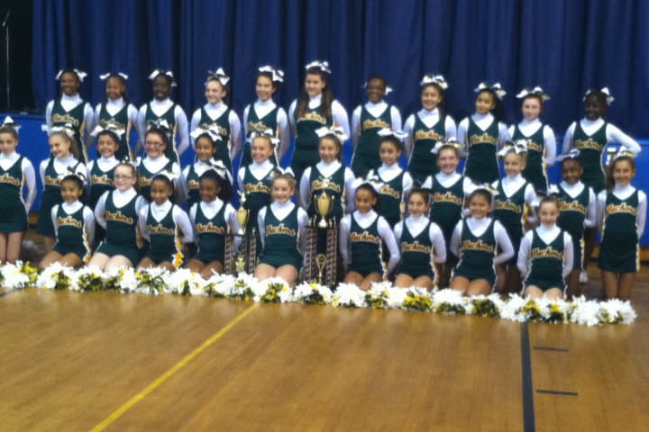The Norwalk Packers cheerleading team earned its first berth in the national championships in six years.