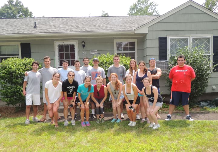 GE Risk Management Program interns and two staff members volunteered to scrape and paint the exterior and trim of a STAR group home.