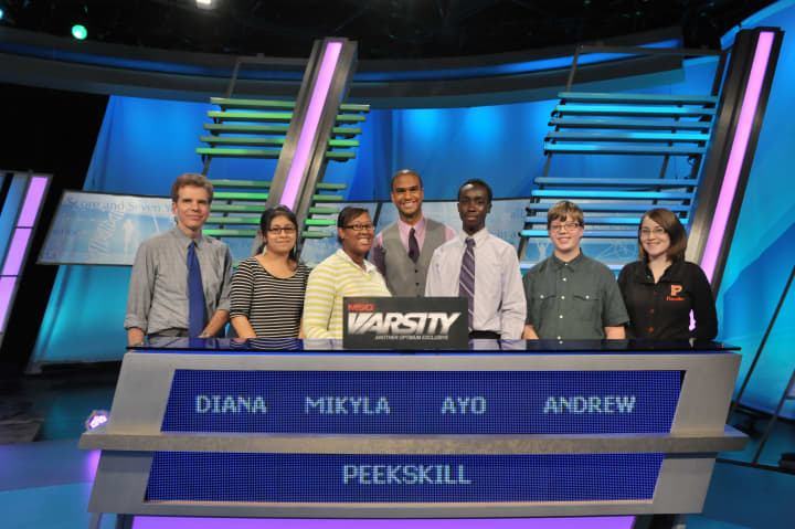 The Peekskill students competing on The Challenge, are Diana Barreto, Mikyla Abdul-Azim (captain), Ayomide Jegeded, Andrew Wise and Toluwanimi Jegede. At left is academic adviser Greg Erickson and in center is &quot;The Challenge&quot; host Jared Cotter.