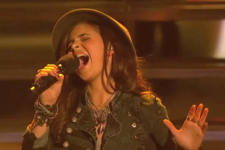 Mamaroneck teenager Carly Rose Sonenclar sang &quot;Rolling in the Deep&quot; on &quot;X Factor&quot; Wednesday night. She&#x27;s hoping to hold onto the No. 1 spot.