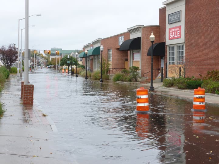 Flooded Water Street in South Norwalk during Hurricane Sandy. Gov. Dannel Malloy is requesting $3.2 billion in federal aid for infrastructure improvements.