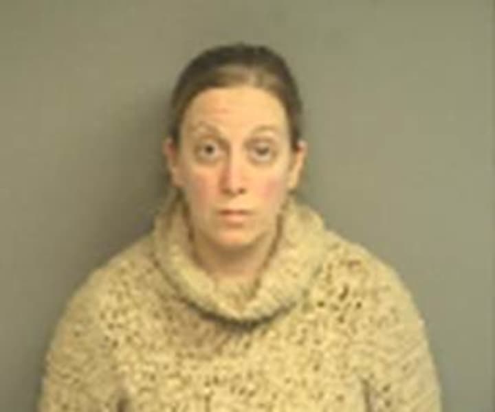 Heather Gansel, 35, of Stamford is charged with embezzling $439,000 from her grandmother. 