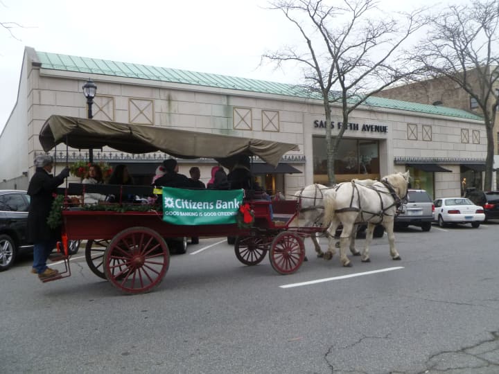 Carriage riders on Greenwich Avenue enjoyed Holiday Stroll Weekend.