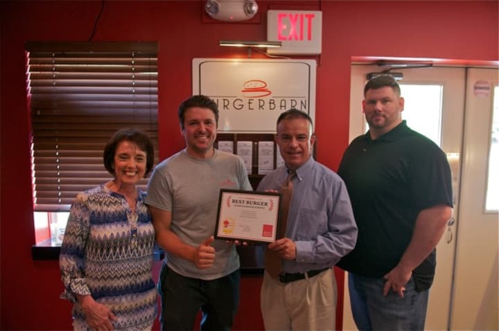 Daily Voice Director of Media Initiatives/Managing Editor Joe Lombardi (second from right) presents DVLicious Best Burger Award to Somers&#x27; Burger Barn (from left): Linda Tesone, Justin Tesone and Paul Sanders.