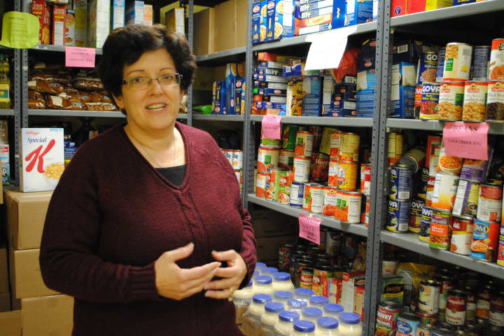 Maria Rykowski stands in the Cortlandt Emergency Food Bank.