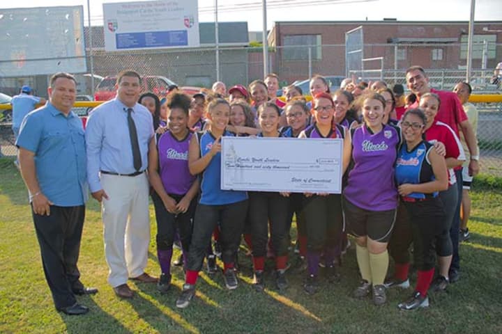 The check presentation to the Bridgeport Caribe Youth Leaders.