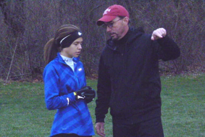 Stamford&#x27;s Megan Rule talks with coach Kevin Foley of the Connecticut Elite at a practice in Wilton last week.