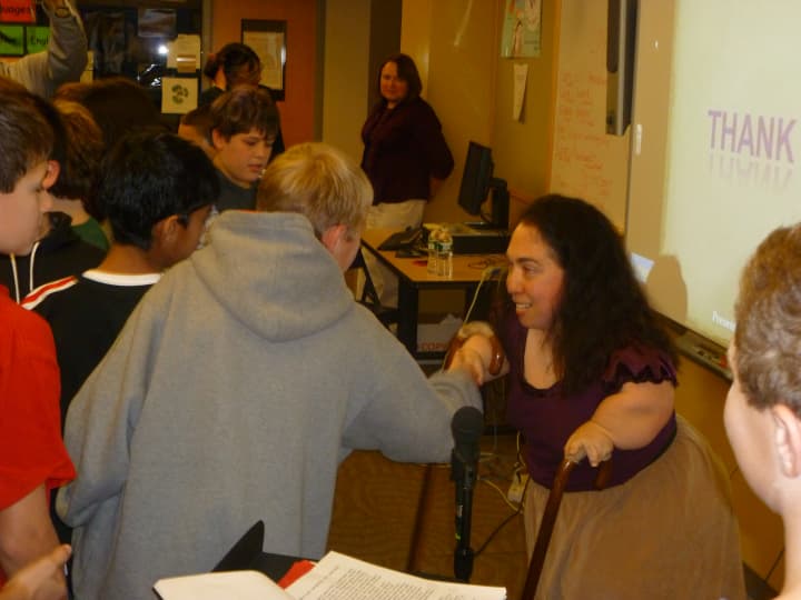 Armonk resident Geri Mariano, pictured at a visit that she made at Seven Bridges Middle School in Chappaqua several years ago.