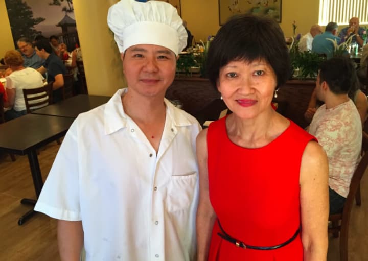 Pearl East restaurant co-owners Ye Sun Ying and Ivy Bacher at the grand opening of their restaurant Thursday.