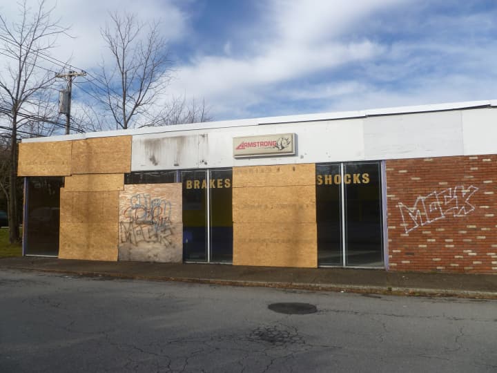 A graffiti-covered building at 1378 E. Main St. in Shrub Oak has not had a tenant in years.