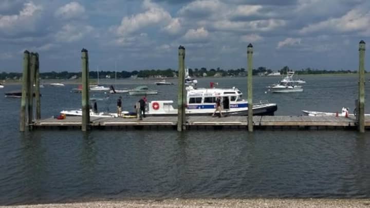 A Stamford woman was rescued after falling overboard off Greenwich on Sunday afternoon.