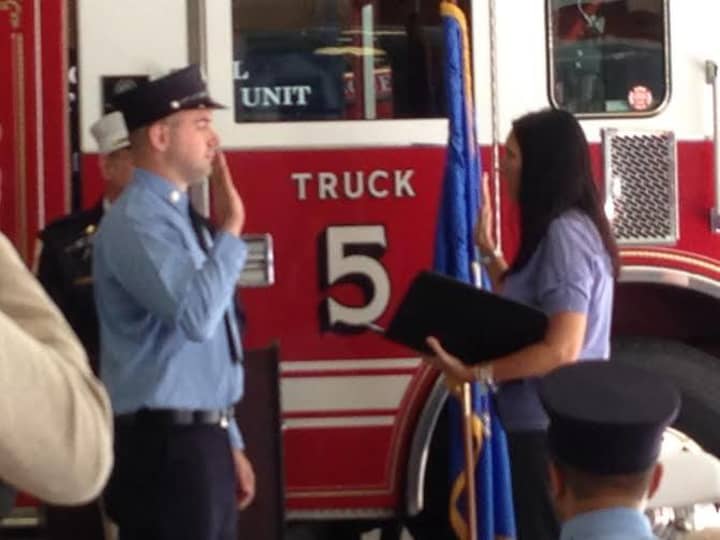 New Wilton Firefighter Don Scarpetti gets sworn in in front of Truck 5.