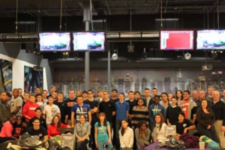 Young people from various Police Explorer posts in Westchester County celebrated Wednesday at Grand Prix New York Racing/Spins Bowl in Mount Kisco. The posts give students from ages 14 to 20 a chance to learn about careers in law enforcement.