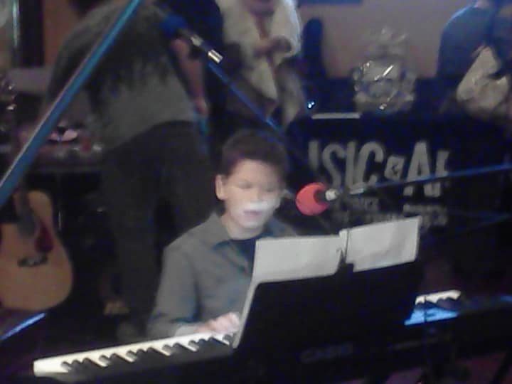 Trent Weschler, 12,  playing and singing &quot;Imagine&quot; by John Lennon