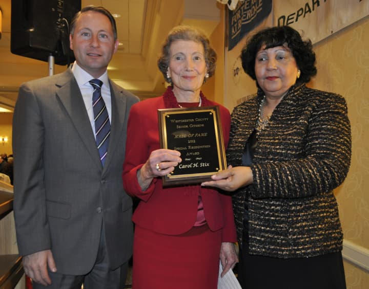 County Executive Robert Astorino poses with Reina Schiffrin and Scarsdale honoree Carol Stix.