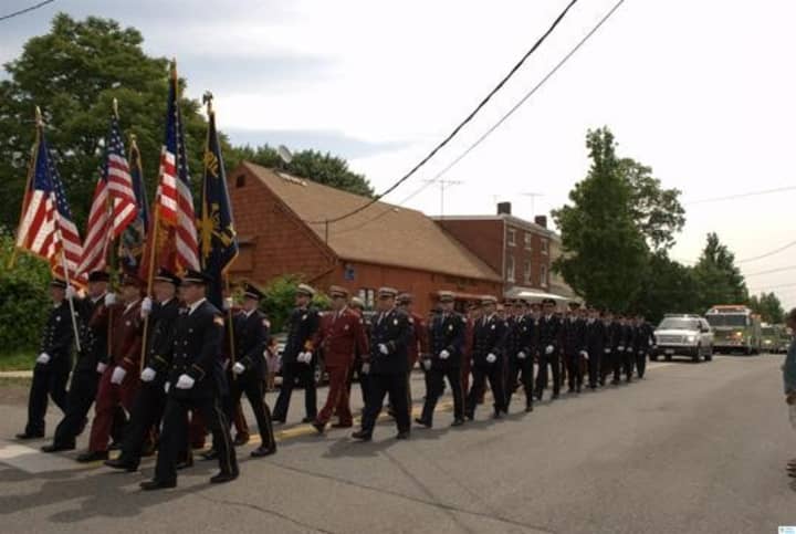 Local fire departments march through Verplanck. 