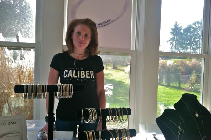 Greenwich resident Jessica Mindich displays her new line of jewelry, the Caliber Collection, at a recent holiday fair in town.