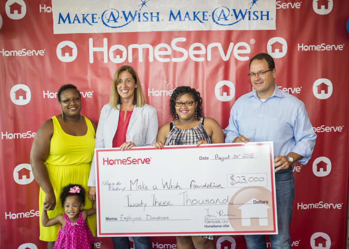 Ms. Lashawnda Cantey, daughter Trinidad, 3; Maria Arnold, Make-A-Wish Connecticut Development Officer; Make-A-Wish recipient Ayasha Cantey; HomeServe USA CEO Tom Rusin
