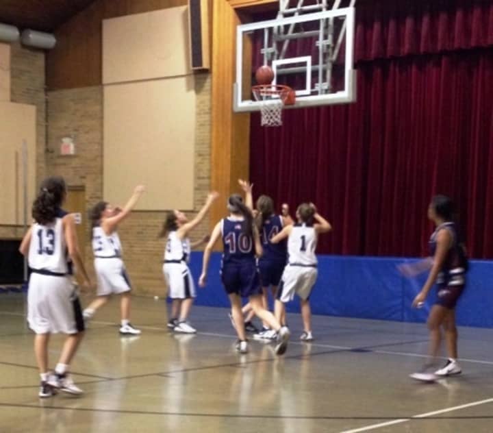The Harvey girls basketball team, in blue, are 3-1 so far this season.