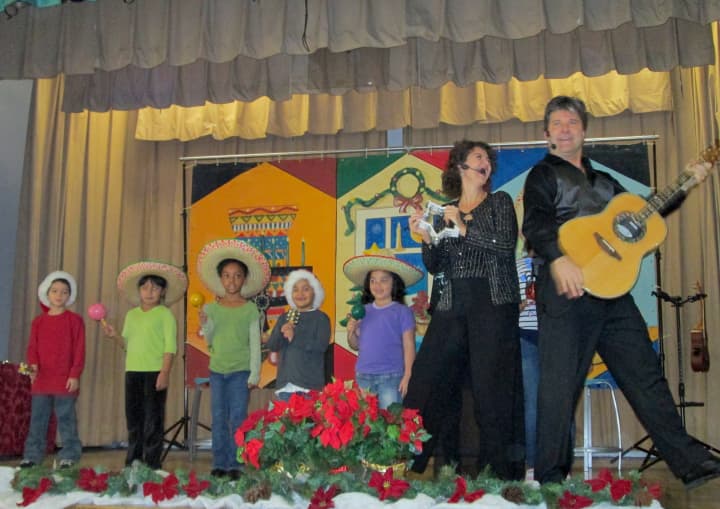 Yonkers School 9 celebrated multicultural holidays with a performance by the musical duo and couple Beth and Scott Bierko. 
