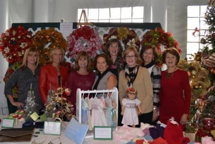 Jill Pankosky, Barbara Kelly, Gail Jones, Diane Musicaro, Kathy Lavery, Chris Falco, Laurie McGrath and Nancy Powell at the Country Club of Darien&#x27;s annual Holiday Luncheon and Boutique.