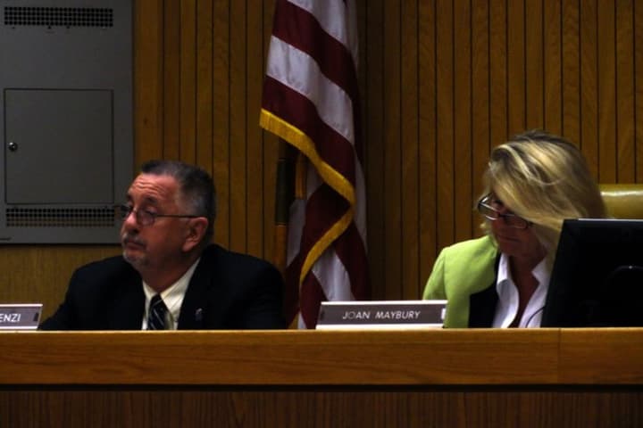 Mount Pleasant Town Supervisor Joan Maybury, right, announces Tuesday that the town saved the jobs of three town employees.